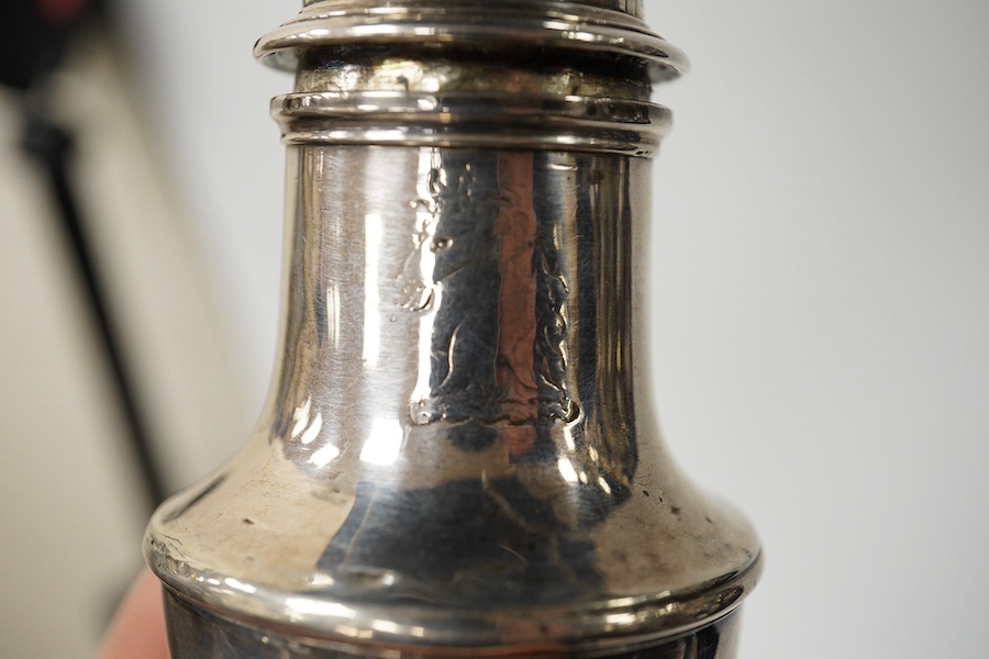 A George II silver baluster pepperette, by Samuel Wood, London, 1749, 14.4cm, 4.5oz. Condition - poor to fair